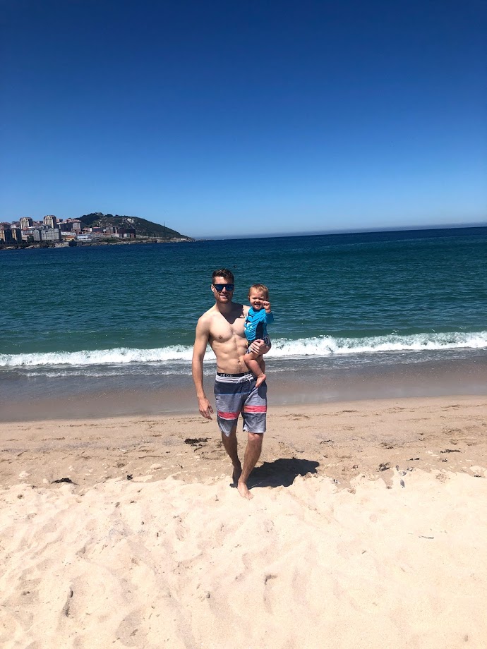 dad with son at beach in A Coruna