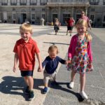 kids outside of palace in madrid