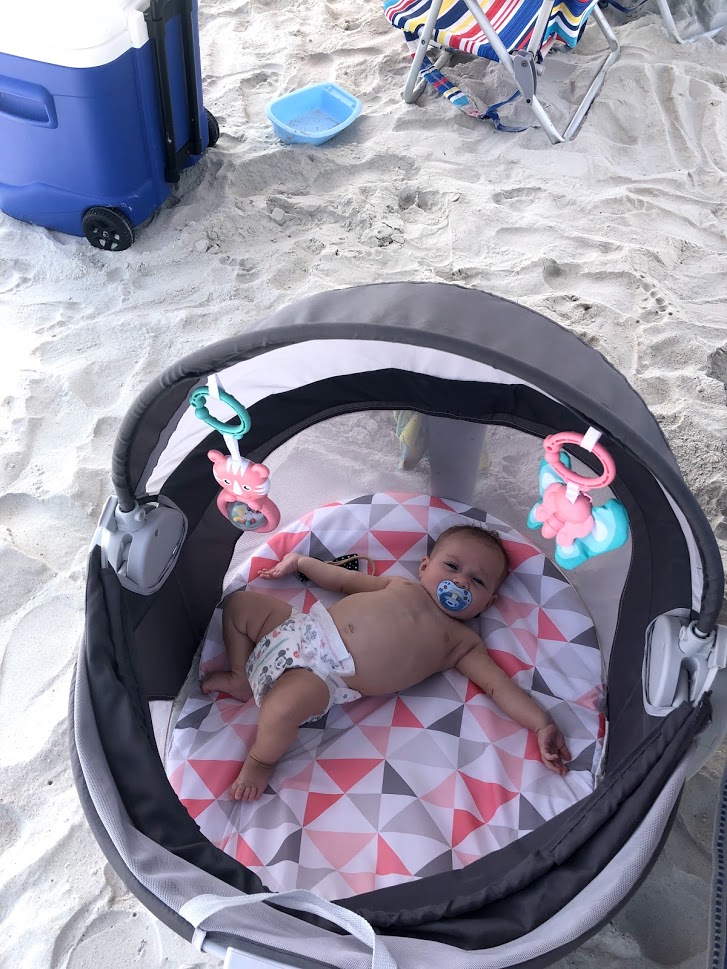 fisher price baby dome at beach