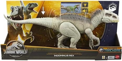 Toy dinosaur used for a creative pumpkin painting idea. Grey T-rex dinosaur from jurassic world.